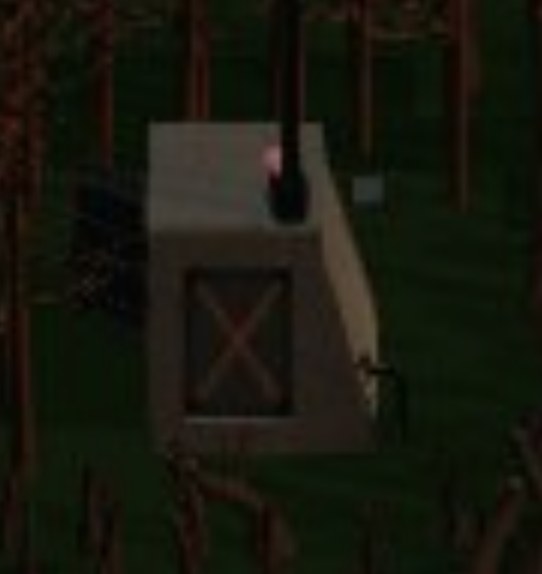 The LSS, a squat concrete structure venting steam, standing in the woods.
